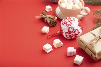 Christmas or New Year composition. Decorations, box, cinnamon, knitted balls, fir and spruce