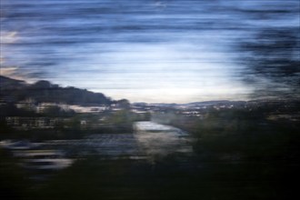 Long exposure from a moving train, Ennepetal, Ruhr area, North Rhine-Westphalia, Germany, Europe