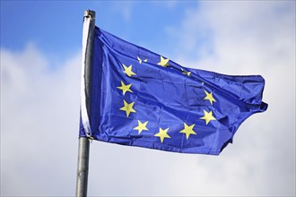 Flag of the European Union in front of a blue sky