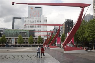 The Schouwburgplein designed by architect Adriaan Geuze modern city square on the roof of a car