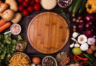 Assortment of ingredients and spices, for cooking, on a wooden background, concept, top view, food