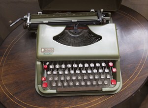 Vintage antares Little Star portable typewriter inside antiques centre, Marlesford Mill, Suffolk,