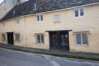 Row of historic almshouses in Kingsbury Street, Calne north Wiltshire, England erected by Dr John