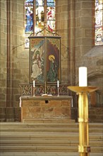 Altar with painting, stained glass window with crucifix and candlestick, stained glass, arts and