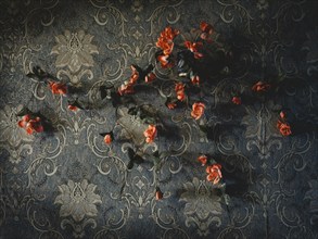 Wallpaper with plastic flowers in a house in Voloska Balakliia. The village is close to the front