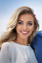 An attractive blonde woman with beautiful teeth, make up, studio, AI generated