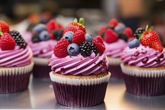 Cupcakes with pink frosting and berry fruits in pastry shop. KI generiert, generiert KI generiert,