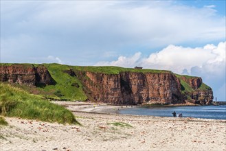 View over the Nordstrand, red sandstone cliff on the offshore island of Heligoland, North Sea,