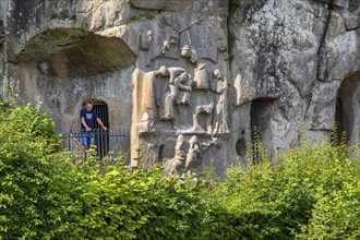 Cross relief at the Externsteine, sandstone rock formation. Horn-Bad Meinberg, Teutoburg Forest,