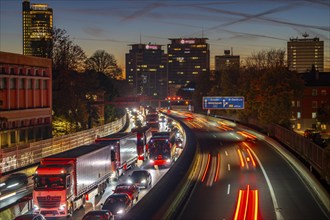 Evening traffic, partly with traffic jams, slow-moving traffic on the A40 motorway, skyline of