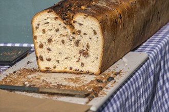 Sale of sultana bread, sultana stollen at a market, Münsterland, North Rhine-Westphalia, Germany,