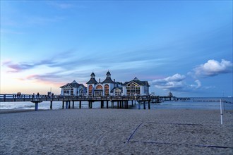 The pier of Sellin, evening mood, sunset, 394 metres long, with restaurant, jetty, beach chairs,