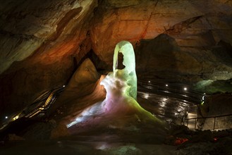 The illuminated Giant Ice Cave, a cave in the Dachstein massif. Obertraun, Salzkammergut, Upper