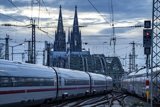 ICE train on the track in front of Cologne Central Station, Hohenzollern Bridge, Cologne Cathedral,