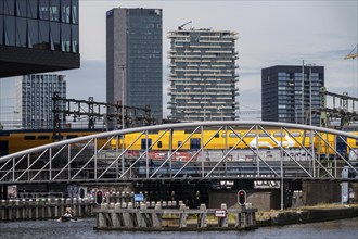 Railway bridge, line directly at Amsterdam Centraal station, crosses the canal from the river Ij to