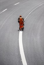 Marking work after the renewal of the road surface on the A40 motorway between the Kaiserberg