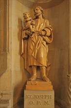 Wooden sculpture of Joseph of Nazareth in the UNESCO Cathedral, Saint, Joseph, Saint, baby Jesus,