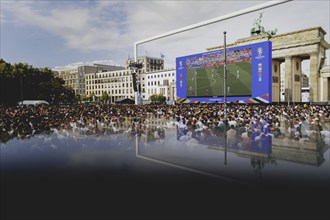 Fans react during the European Championship preliminary round match between Germany and Hungary on