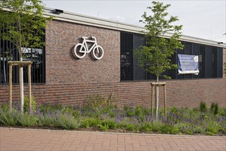 Bicycle car park with bicycle symbol, Dülmen, Münsterland, North Rhine-Westphalia, Germany, Europe