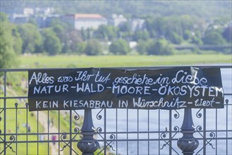 Protest banner at the Dresden Albert Bridge, Everything you do, be done in love. Nature, forest,