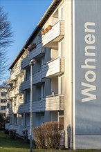 Residential buildings, rented flat, facade with the inscription, Wohnen, on Adolf-Schmidt-Strasse,