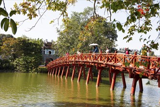 Huc Bridge (red bridge), entrance to Ngoc Son Temple on Hoan Kiem Lake, Hanoi, Vietnam, Asia