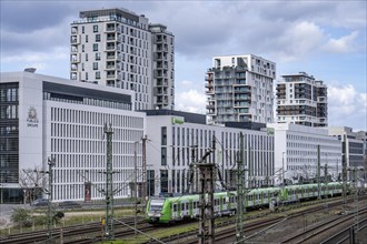 Railway line in Düsseldorf, along Toulouser Allee, residential area, office building, on former