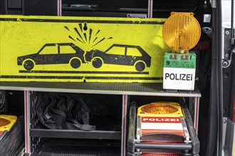 Motorway police patrol cars, warning signs, beacons, signal lamps