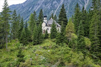 Lake chapel Maria am See, Obernberger See, mountain lake, landscape of the Stubai Alps, weather