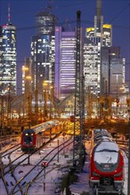 Railway tracks in front of the main railway station in Frankfurt am Main, skyline of skyscrapers in