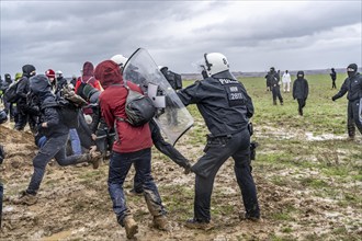 Violent clashes between thousands of demonstrators and the police, after a demonstration against