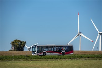 Wind farm near Lichtenau, wind turbines, country road, Driburger Straße, local bus, public