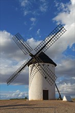 A windmill in front of an impressive sky full of clouds, Campo de Criptana, Ciudad Real province,