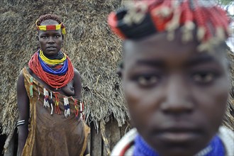 Portrait of a teenage girl and a young woman from the Karo tribe, Omo valley, Ethiopia, Africa