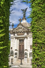 Mausoleum and trimmed bushes, historical cemetery Cementerio Sara Braun, city of Punta Arenas,