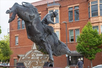 Pueblo, Colorado, A statue of a bull rider outside the headquarters of Professional Bull Riders