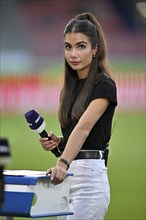 TV presenter Lea Wagner in an interview, Microphone, Logo, SWR, Voith-Arena, Heidenheim,