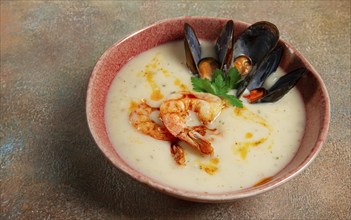 Cream soup, chowder with mussels and shrimp, American cuisine, homemade, no people