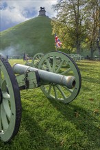 Replica of French Napoleonic war 6-pound cannons and Lion's Mound at the Domain of the Waterloo