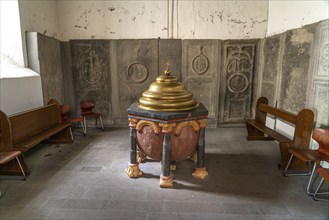 Baptismal font in the interior of the collegiate church of St Castor in Karden, Treis-Karden,