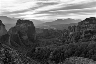 Sandstone formations, rock needles at sunset, backlight, monochrome, Meteora, Thessaly, Greece,