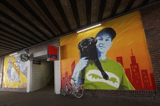 Man with a pug on his shoulder, mural in a subway, urban art in the Oberbilk district, Düsseldorf,