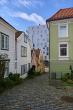 Historic town centre of Bergen with narrow streets and cobblestones surrounded by traditional