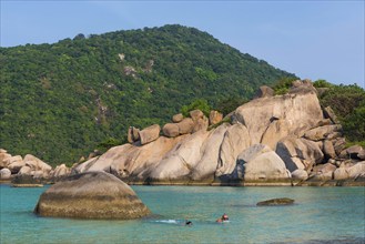 Bathing bay with turquoise water and granite rocks on the holiday island Nang Yuan Island, island,