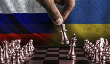 Russia vs Ukraine conflict concept on chessboard. Political tension of Russia and Ukraine