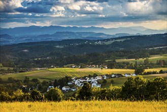 View of the Rhine Valley, with the Jura and the Swiss Alps in the background, sunset, near