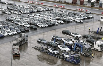 Tesla Y new cars are loaded onto car transporters at the Tesla Giga Factory, Grünheide, 25.09.2024