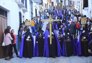 Easter Christian religious procession through streets of Setenil de las Bodegas, Cadiz province,