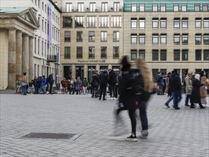 Motion blur, tourists and passers-by at Pariser Platz, Berlin, Germany, Europe