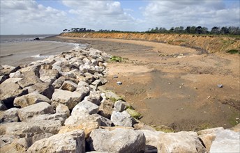 Rock armour barriers to control coastal erosion, Bawdsey, Suffolk, England, United Kingdom, Europe